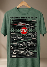 Load image into Gallery viewer, Green t-shirt with car graphic and GTA logo on a hanger against a beige background