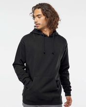 Load image into Gallery viewer, Man wearing a black hoodie against a white background